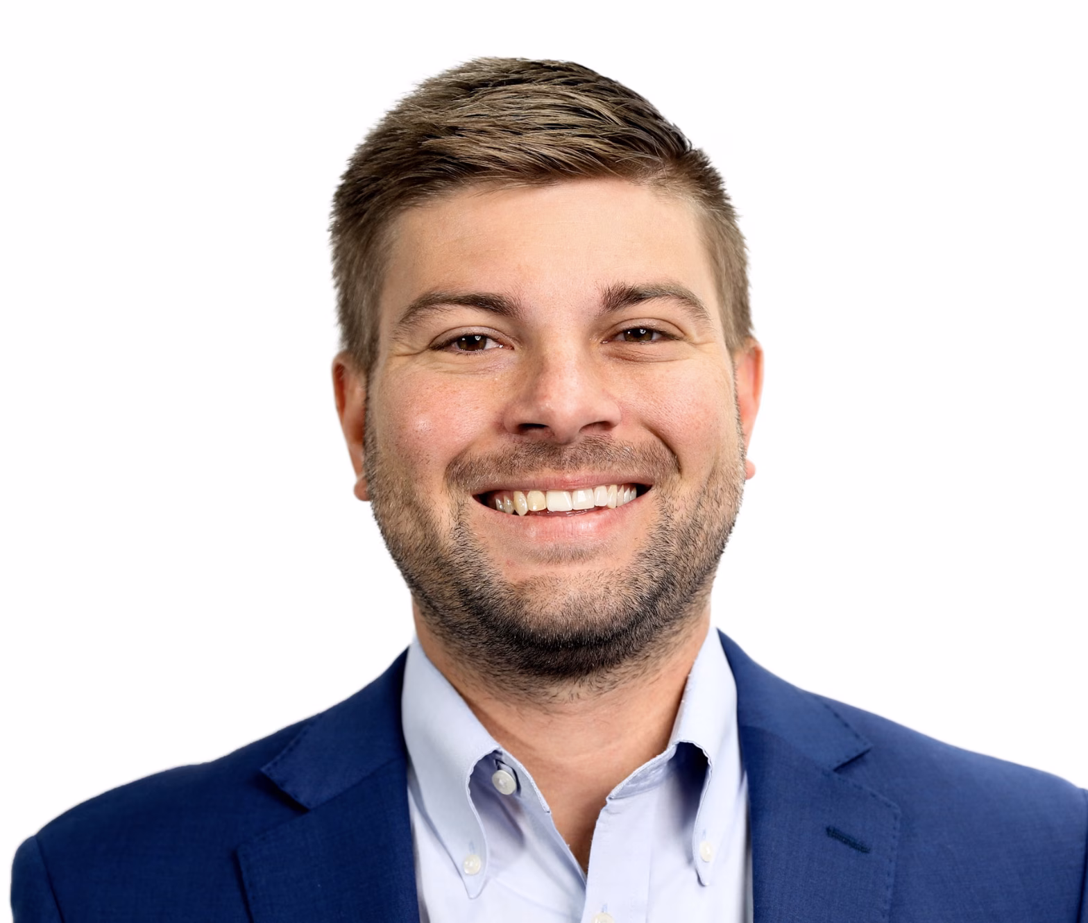 A man with short hair and a beard, wearing a blue suit jacket and light-colored shirt, smiles at the camera against a white background, representing his auto glass repair business.